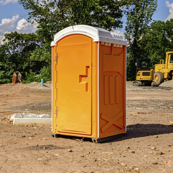 how often are the portable restrooms cleaned and serviced during a rental period in Holland IA